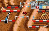 In-game screen of the game Super Off Road on Atari Lynx